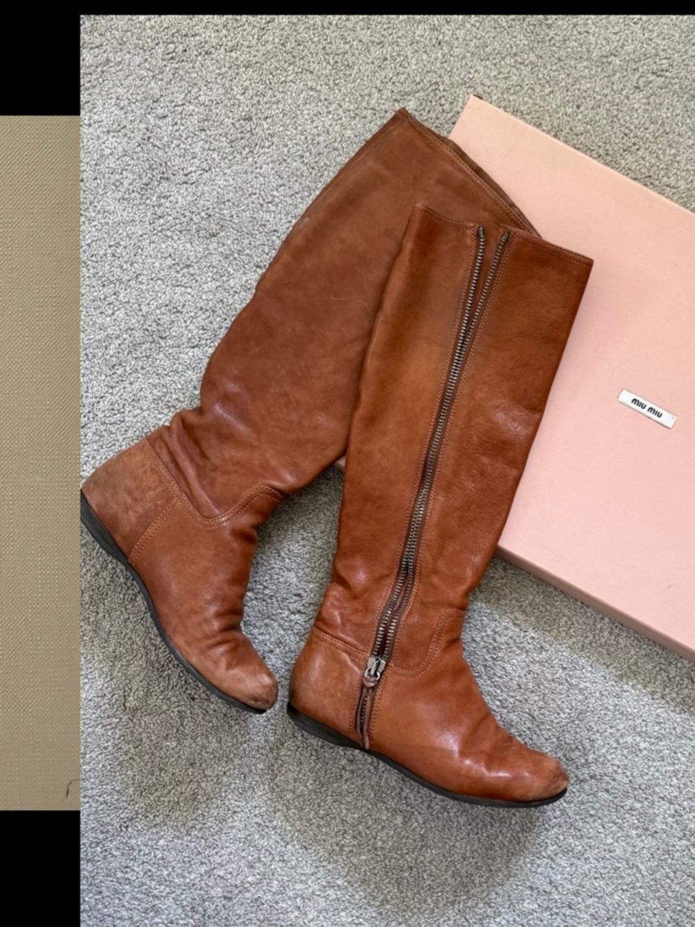 $950 Miu Miu Leather Flat heel Zip Boots shows wear but still ok